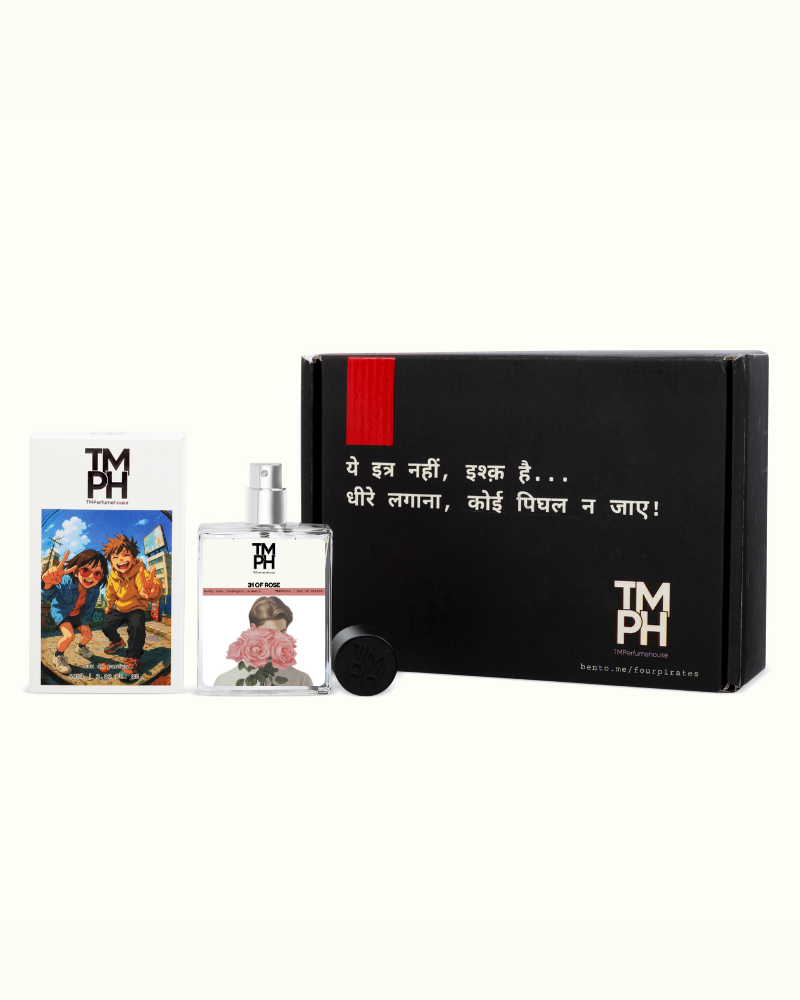 Perfume bottle with packaging and posters featuring 'TMH' branding on a white background